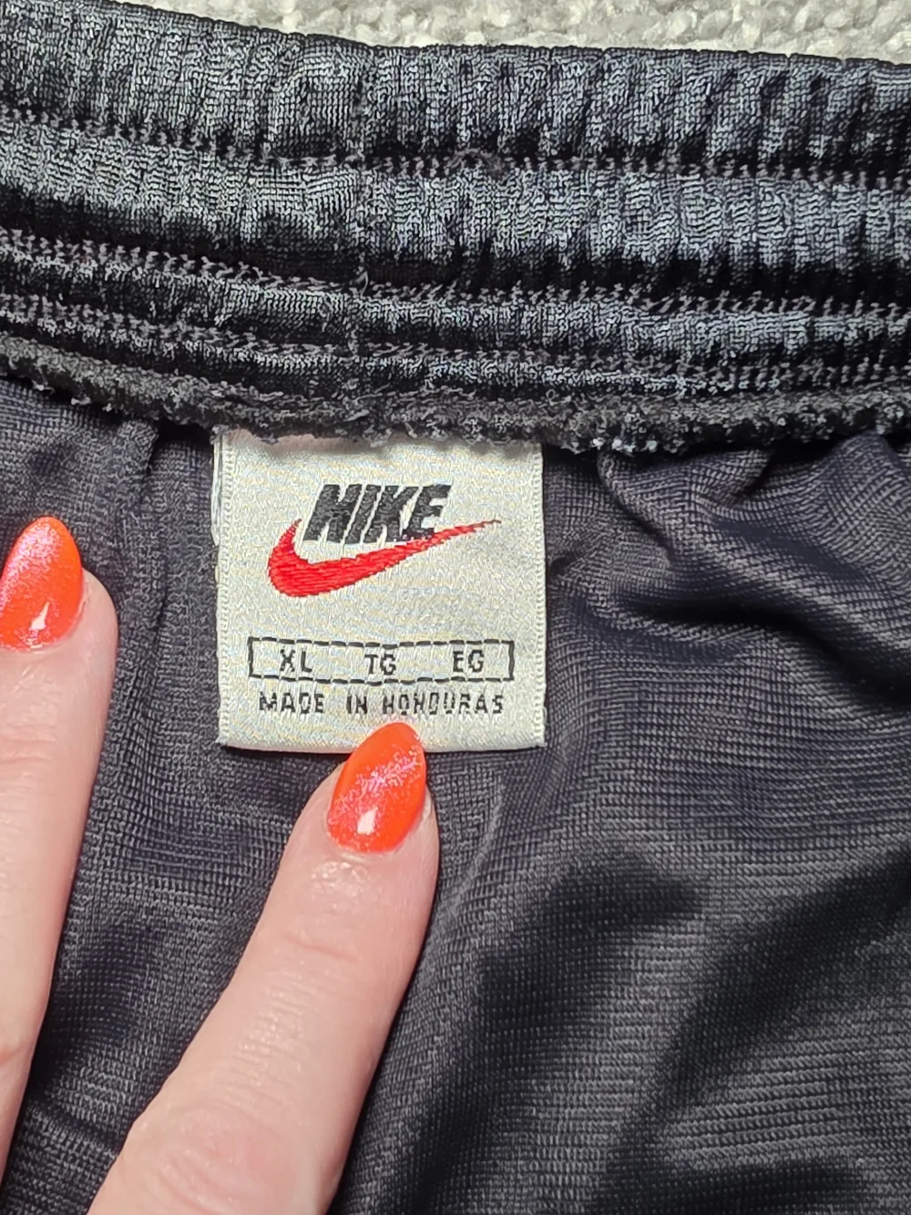 Nike Men’s Black Athletic Mesh Shorts with White Swoosh